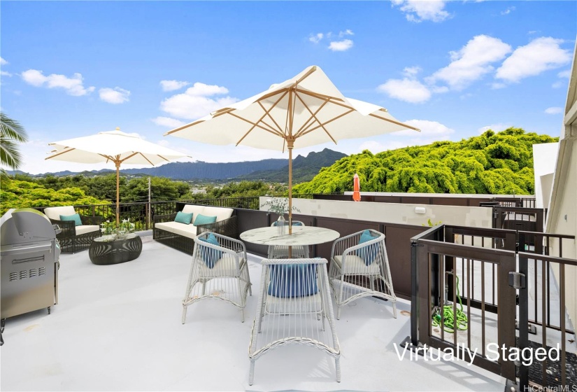 Experience paradise from your top-roof deck, perfect for entertaining.