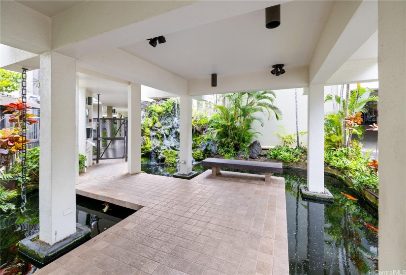 Take a glimpse of the tranquil atmosphere of the Koi fish stream courtyard as your entrance to your new home!