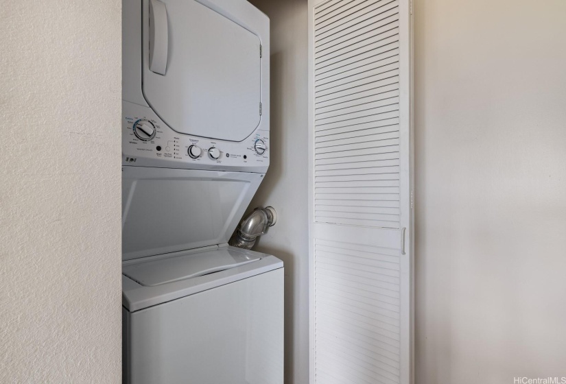 The washer/dryer is conveniently located in the unit.