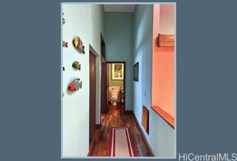 Upstairs hallway leading to the two upstairs bedroom, bathrooms and stairs to the downstairs area, 15-857 Paradise Ala Kai Drive...