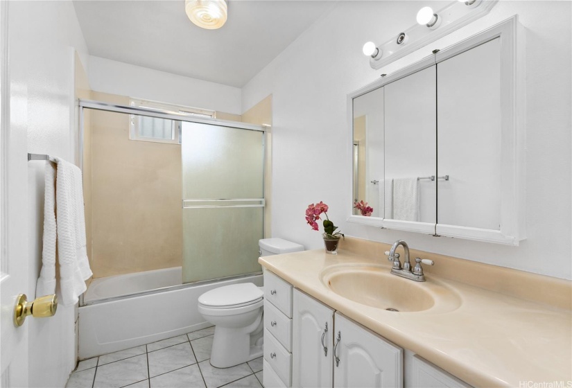 One of the two full bathrooms upstairs.