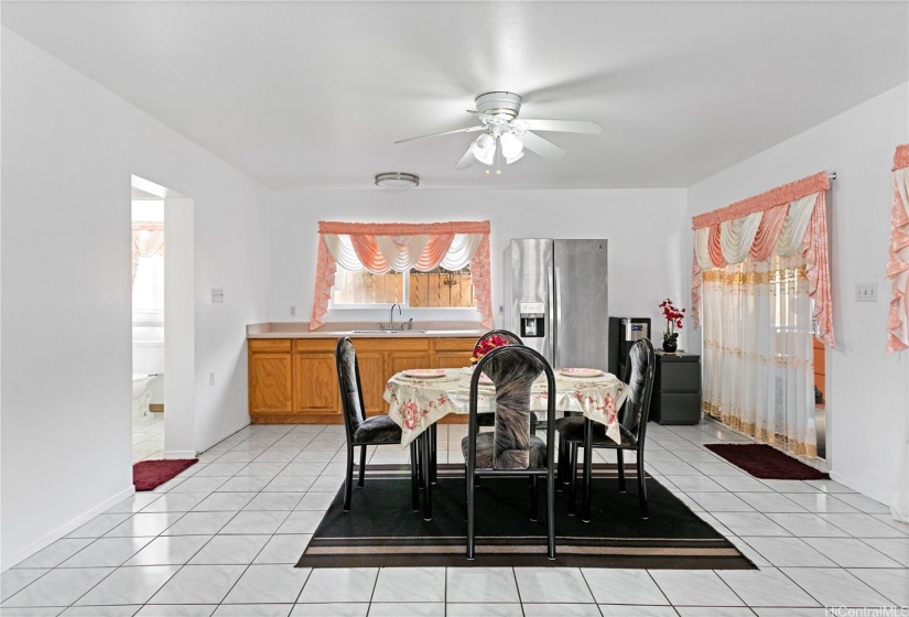 The dining area and wet bar are visible from this vantage point.