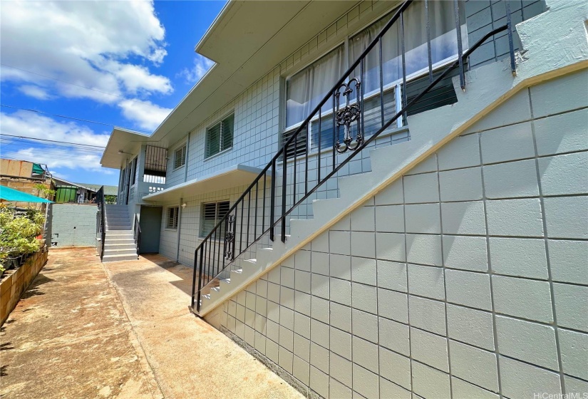 Exterior of property with upstairs separate access