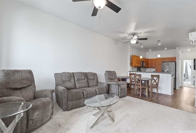 Kitchen and Living room flow together in this open concept space