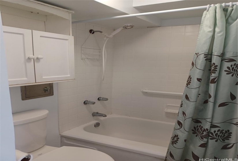 Bathroom with tub and shower