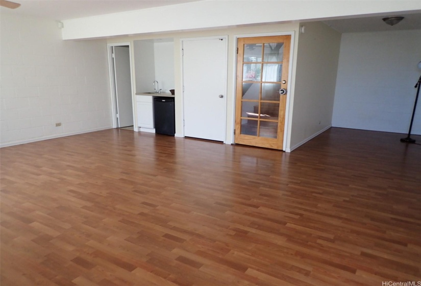 Downstairs room with bathroom. Entrance from garage.