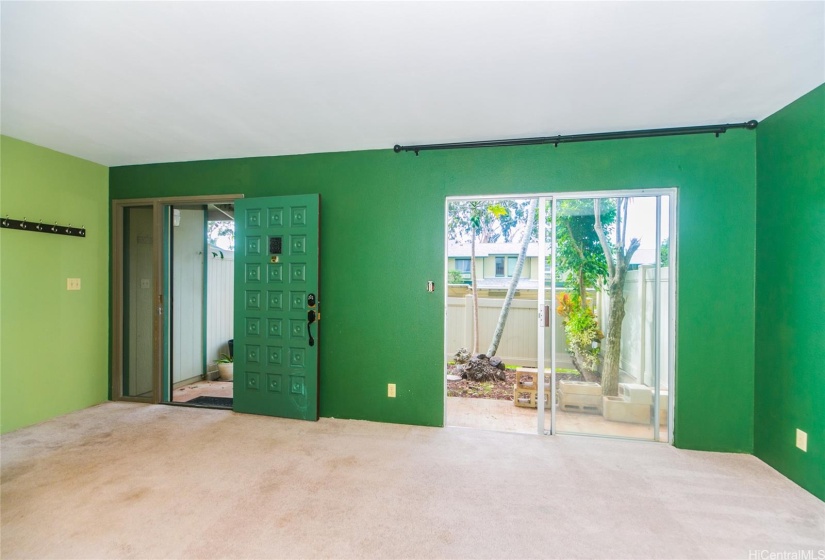 living room looking out to front courtyard.