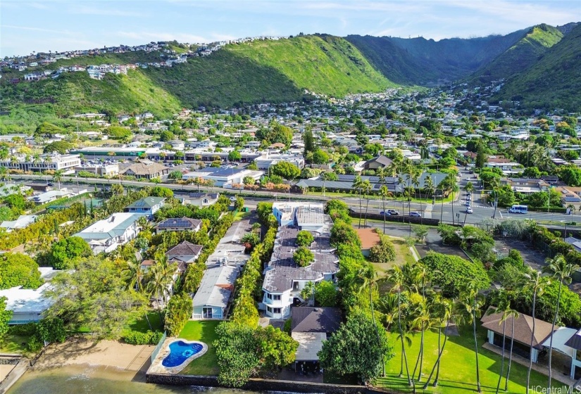 Aerial view of property, toward mountains