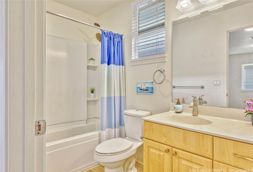 Full Guest Bathroom. Virtually staged & enhanced.