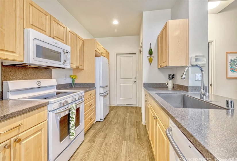 Kitchen area. Virtually staged & enhanced.