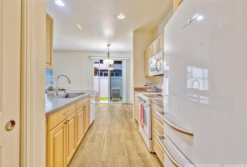 Kitchen area. Virtually staged & enhanced.