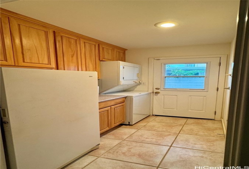 Separate laundry room.