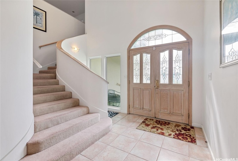 elegant entry way with high ceilings, up the stairs to 2 more en suite bedrooms, with good separation from each other.