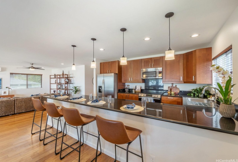 Upstairs Kitchen With Large Bar For Entertaining