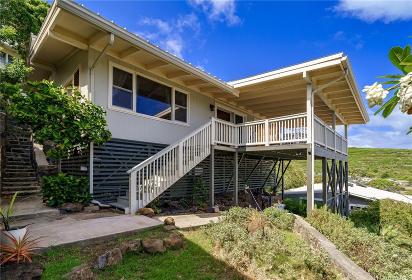 In addition to the spacious interior and huge lanais, this home has several other areas for planting, leisure, or recreation.  There's a nice covered space under the front lanai, small yard space, and then great space under the home for a workshop or additional storage.