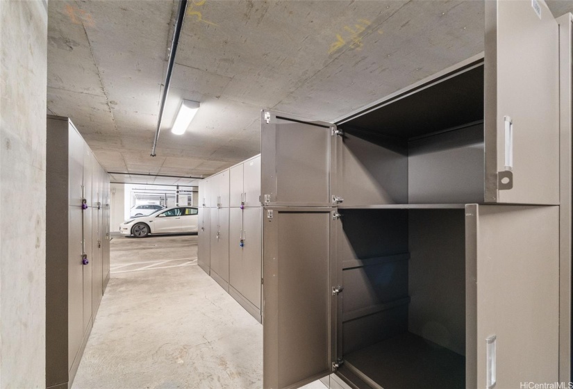 Storage locker with adjustable shelving is located on the third floor of the parking garage.