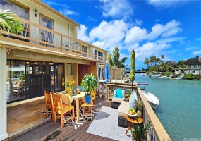 Large patio with a rebuilt deck. 20 ft boat dock below