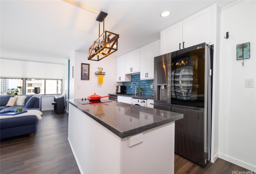 QUARTZ COUNTERTOPS AND UPGRADED LIGHTING.