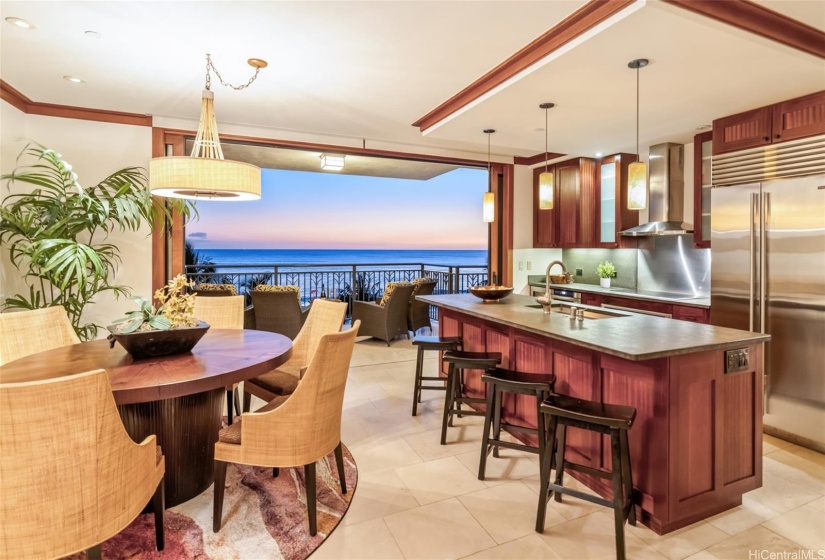 Chef Roy Yamaguchi-designed kitchen with dining area.