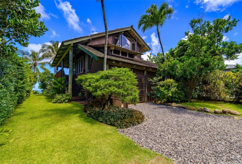 Beautifully landscaped and very well maintained home with direct access to the beach