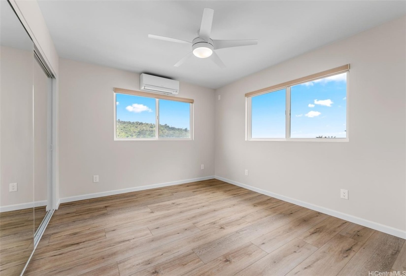 Second of three bright, sizable bedrooms on 2nd level. Ocean & valley views.