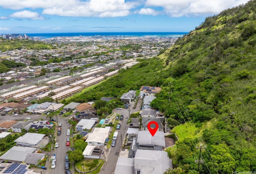 Sweeping views across Kalihi Valley toward the blue Pacific Ocean.