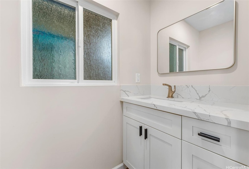 Powder room of upper level 4BR/2.5BA.