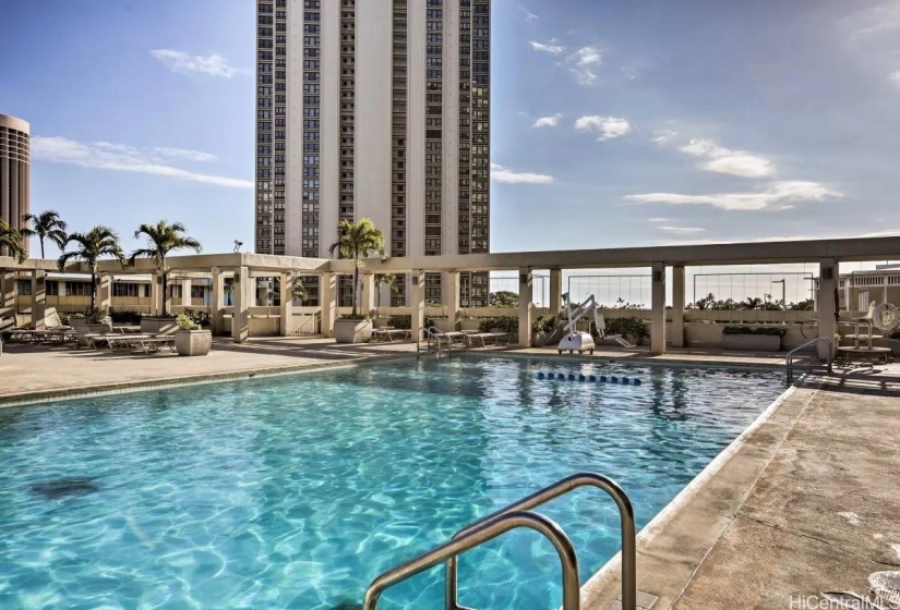 Heated, saltwater pool alongside the Fitness Center and Pool Bar