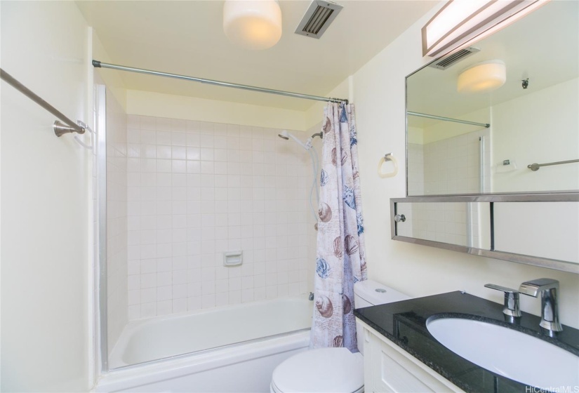 Newly refinished tub and new vanity, too.