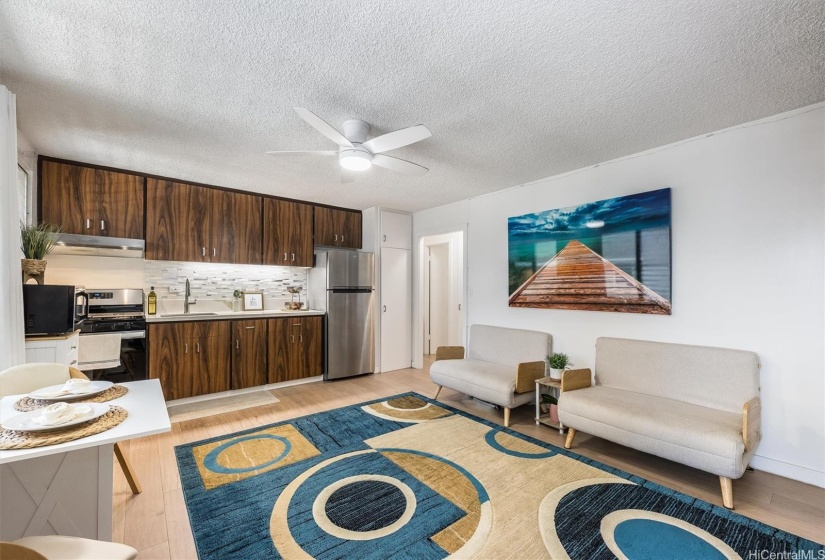 Kitchen, dining area and living room.