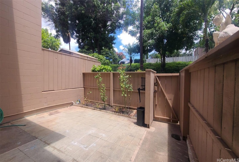 Large fenced in front courtyard