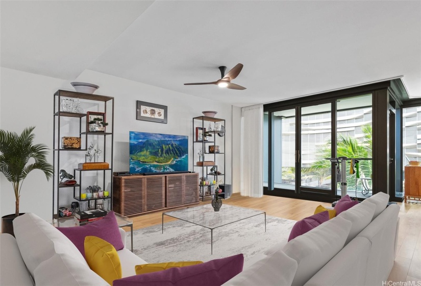 Spacious living area leads to your large open Lanai. Relax here with friends and family. Partial virtually staged.