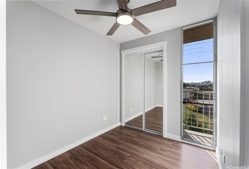 Bedroom 2 with mirror closet doors, new window hardware