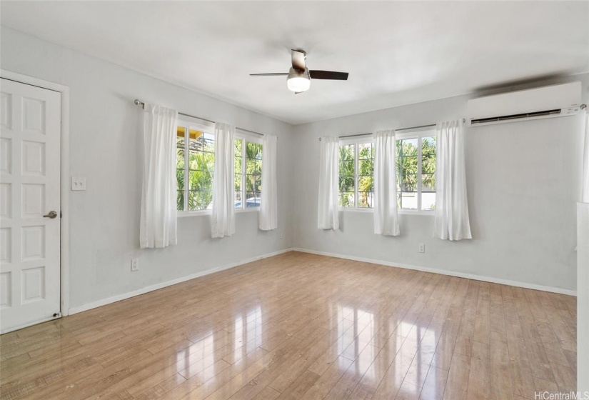 Living room with front door entrance