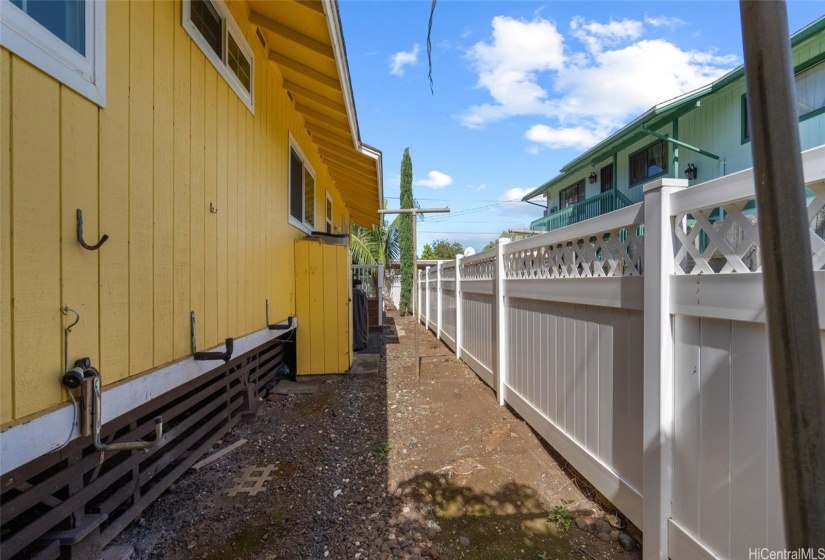 Backside of the house fully fenced with vinly fencing