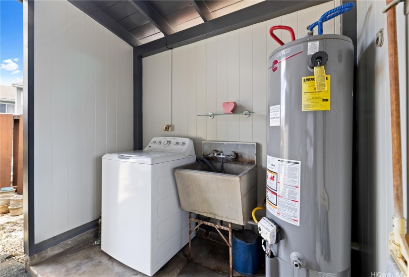 Washer & Water Heater in carport