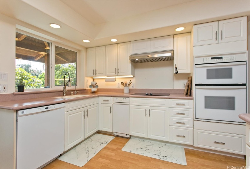 Main Kitchen is open, airy with views both toward the mountains and the ocean.