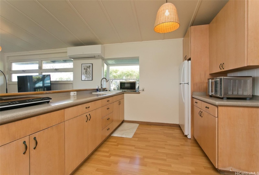 Guest Cottage has Efficiency Kitchen large enough for separate entertainment.