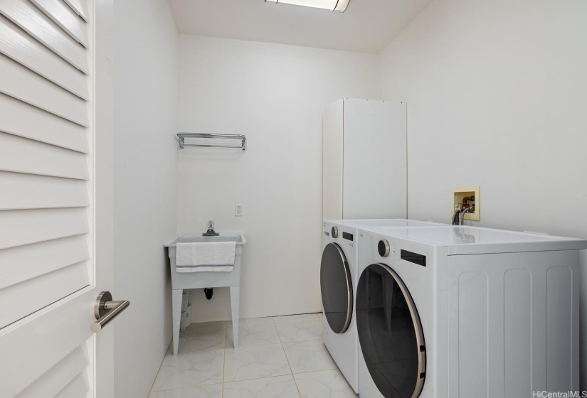 Laundry facilities conveniently located on the pool level