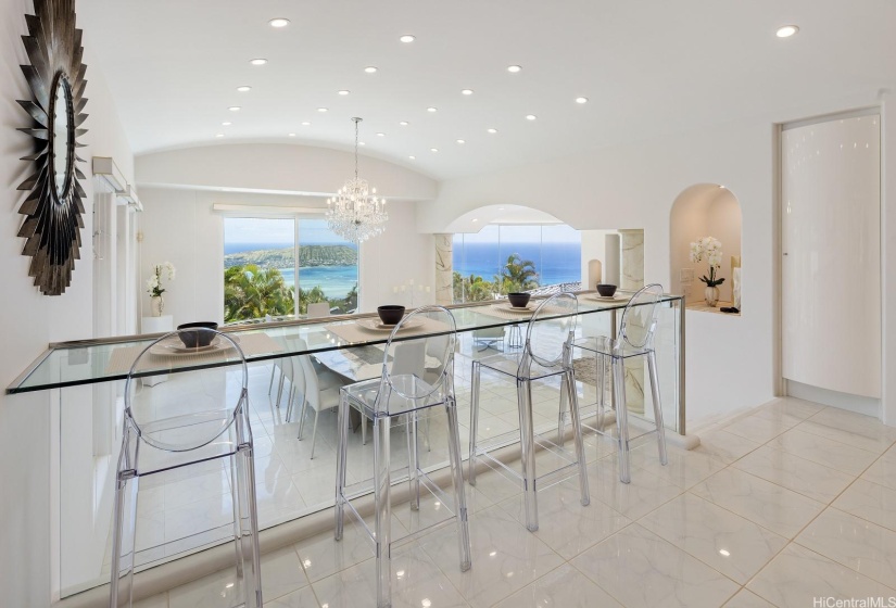 Kitchen has this counter featuring a scenic view