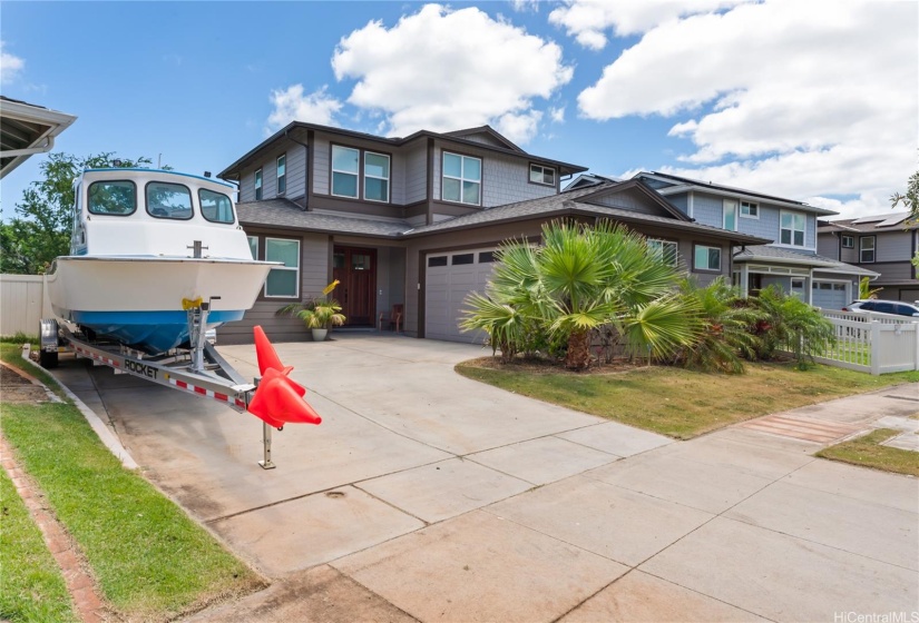 Exterior with Boat to show extended driveway