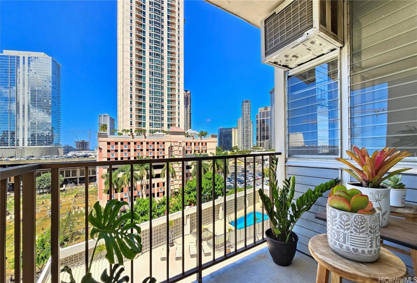 A spacious & breezy lanai offering sweeping city views.