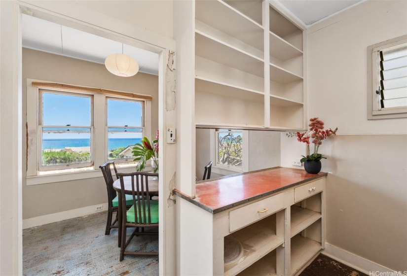 Kitchen with dinette beyond