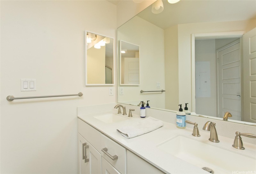 Primary bathroom with double sinks.