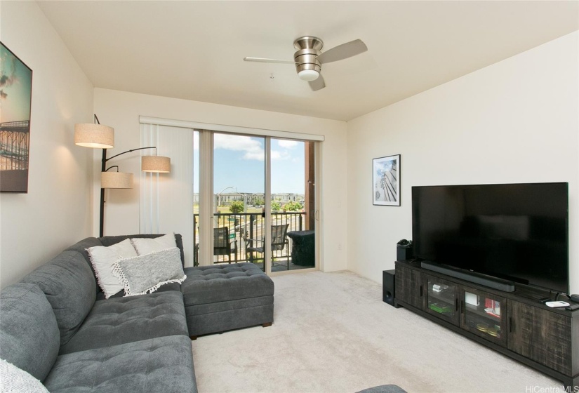 Another view of the living room looking towards lanai.