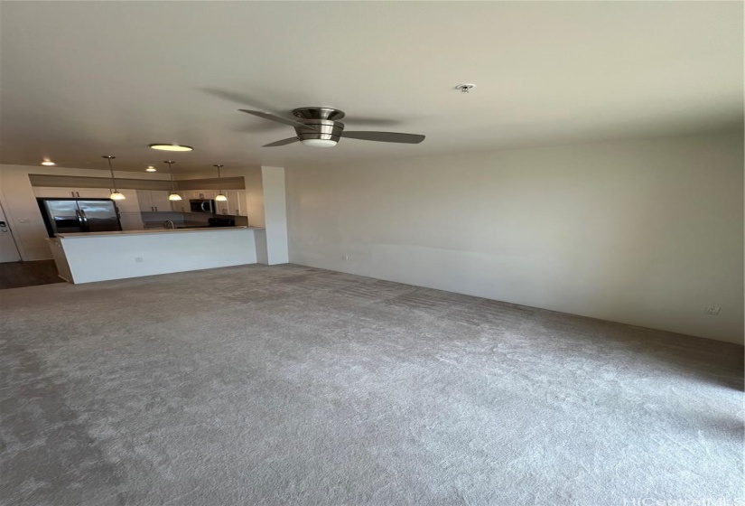 Living room, view from lanai looking towards kitchen.