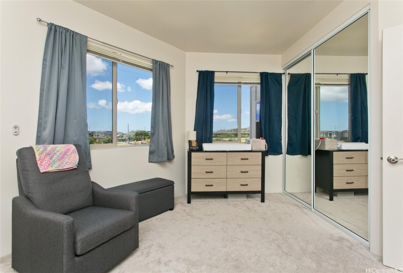 The 2nd bedroom at this Kohina at Ho'opili unit.