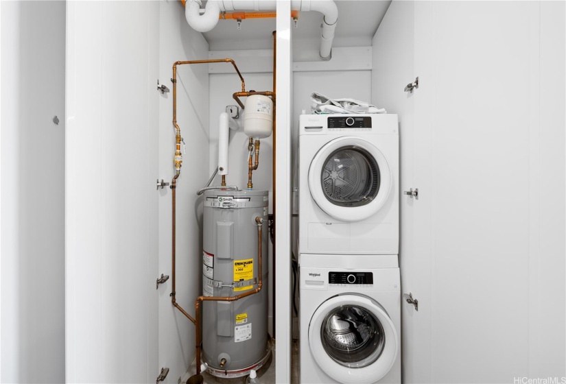 Washer and dryer with water heater appliance.