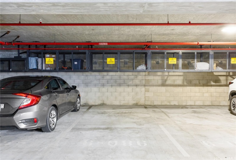 Parking stall has overhead storage great for easy to store adventure gear.