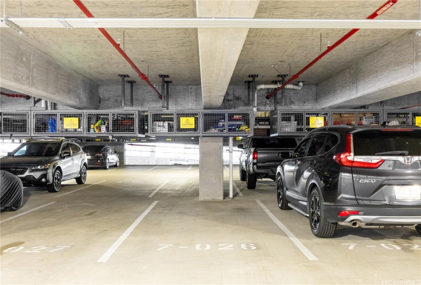 Parking stall has overhead storage great for easy to store adventure gear.